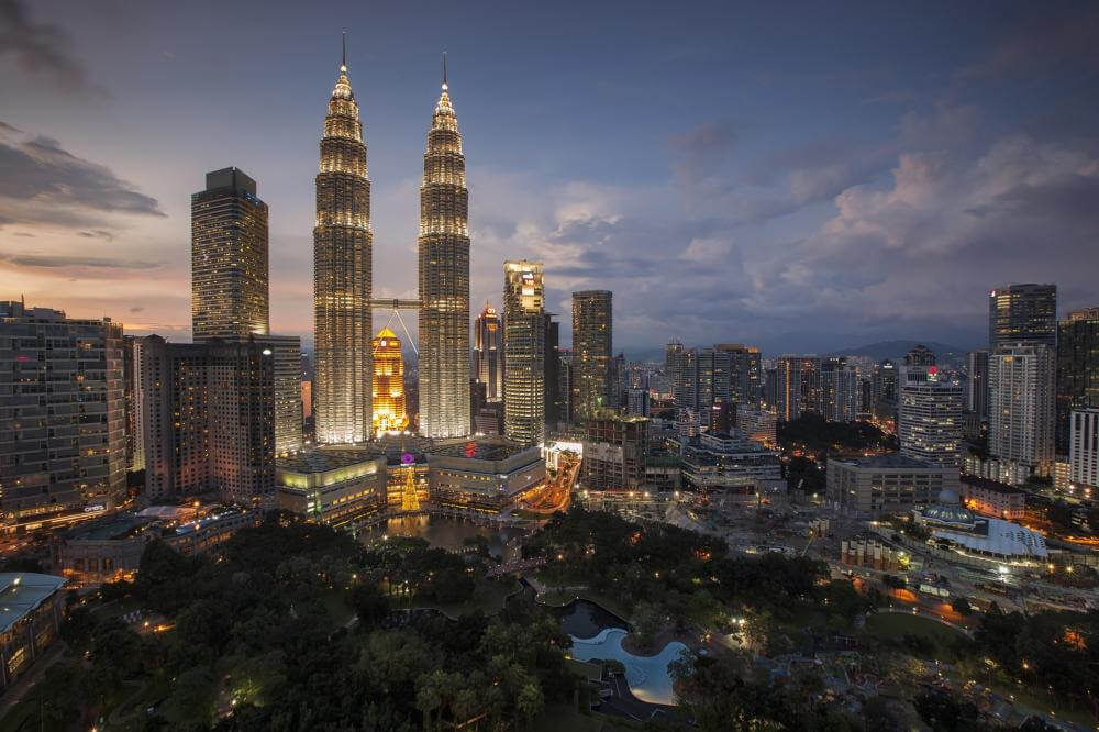 far away view of the petronas towers and KL skyline