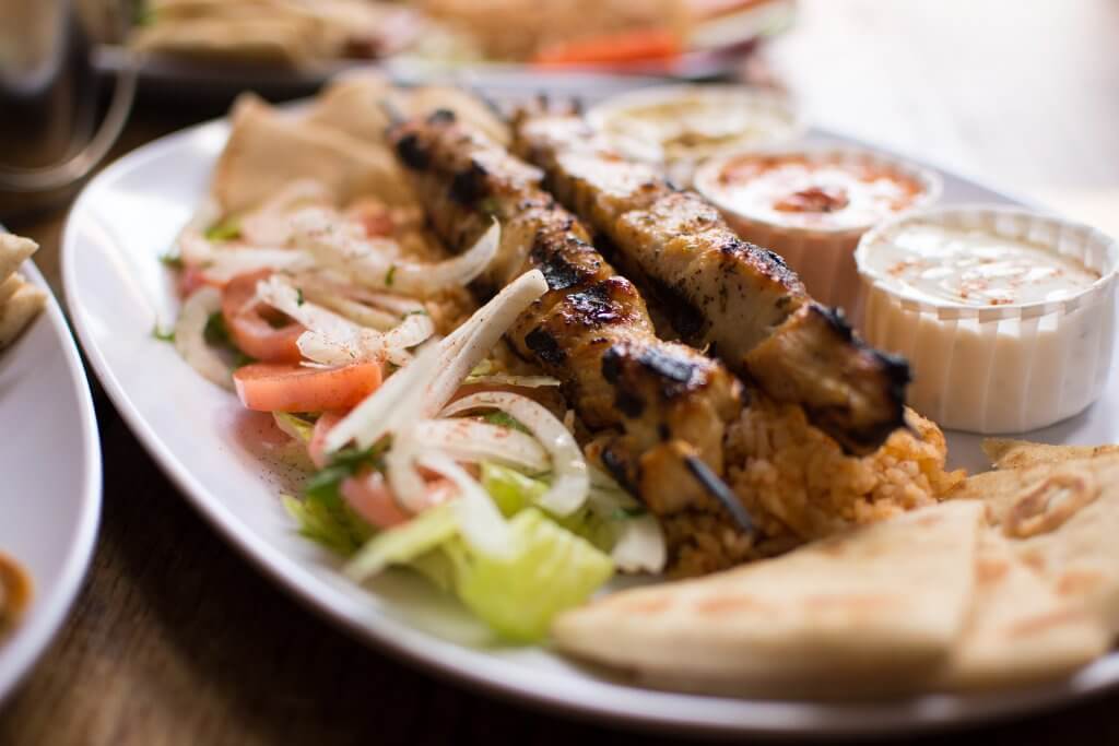 a plate of Greek souvlaki